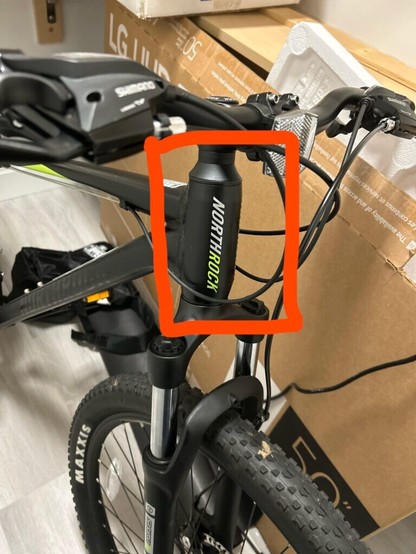 Does anybody know how to but the top of the suspension back on the north rock xc 27 from costoco