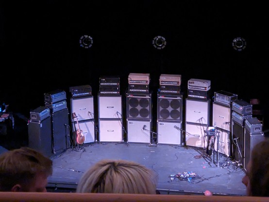 A curved wall of guitar amplifiers used by the two-piece band Sunn O))).