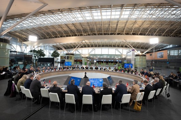 A round conference table  at Boryspil International Airport during a tenth meeting regarding the implementation of Ukraine’s Peace Formula