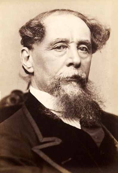 Portrait of Dickens, with receding hair, and bushy goatee and mustache. By Jeremiah Gurney - Heritage Auction Gallery, Public Domain, https://commons.wikimedia.org/w/index.php?curid=8451549