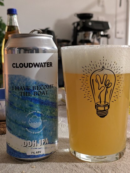 Can of Cloudwater IPA, golden beer in the glass next to it