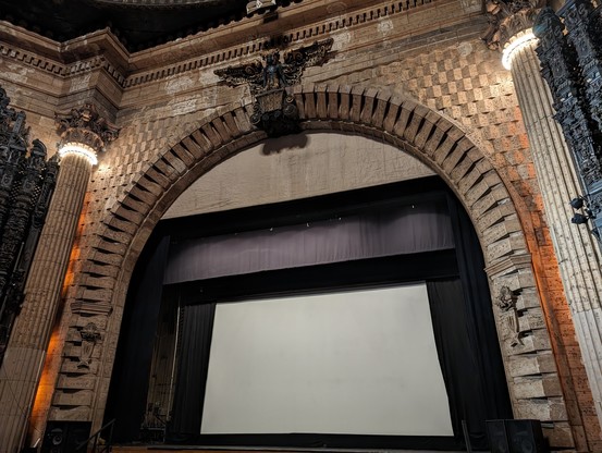The interior of the Million Dollar Theater in an art deco style.
