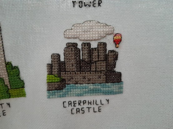 I am making a Uk and Ireland landmarks cross stitch sampler and just finished my first Wales landmark!