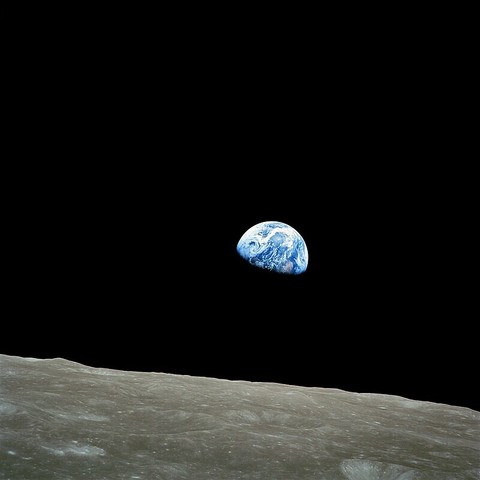Earthrise, taken on December 24, 1968, by Apollo 8 astronaut William Anders,
showing the Earth "rise" over the moon horizon.

NASA/Bill Anders - http://www.hq.nasa.gov/office/pao/History/alsj/a410/AS8-14-2383HR.jpg

Taken by Apollo 8 crewmember Bill Anders on December 24, 1968, at mission time 075:49:07 [8] (16:40 UTC), while in orbit around the Moon, showing the Earth rising for the third time above the lunar horizon.