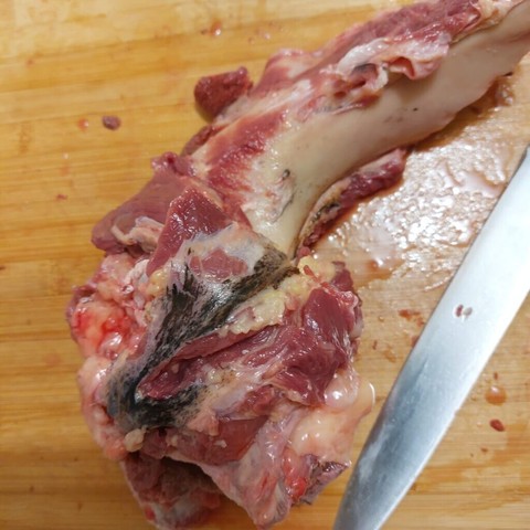 Guys whats is this black thing? Is it ok to eat? Thats fresh meat from a butcher