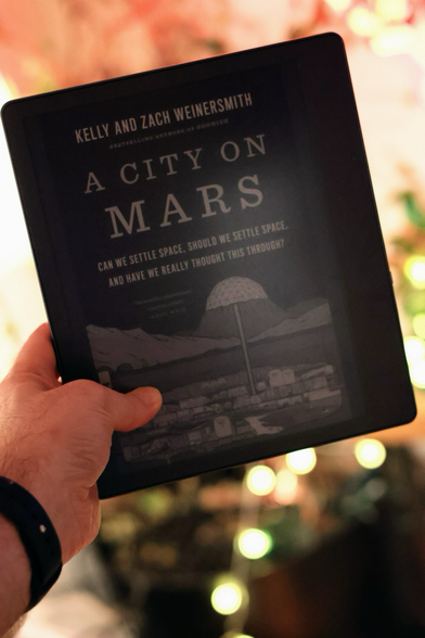 Amazon Kindle with â€œColonizing Marsâ€� Book