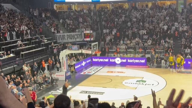 Israeli abroad Fenerbahce guard Yam Madar is hit by a coin thrown by Besiktas fans as as he goes down bleeding from his eyebrow!