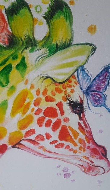 a close-up of the giraffe's head and a purple butterfly