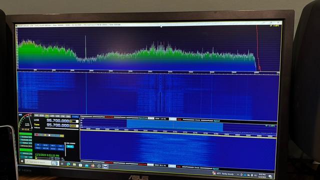 Photo of the HDSDR application receiving the transmission from the exciter, showing the full FM baseband in a spectrum analyzer style graph.