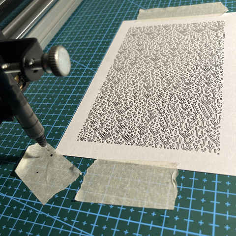 An index card with a marching squares cellular automaton pen plot printed using a black pen