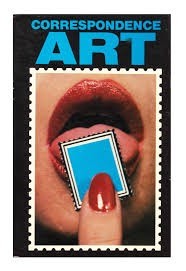 A cover of a book called Correspondence Art. A lipstick red lip, licking a blue stamp that could be an outsize tab of LSD