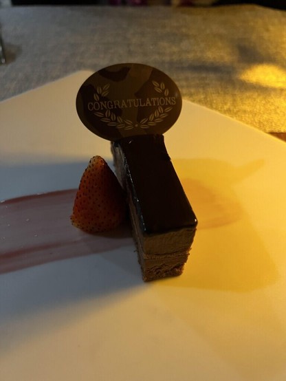 [OC] Simple chocolate ganache cake from our resort in Waikiki in celebration of our honeymoon
