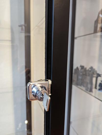 The slit between the glass door and the metal frame is sealed by a brush like thingy that adjusts to the angle of the door and prevents airflow.