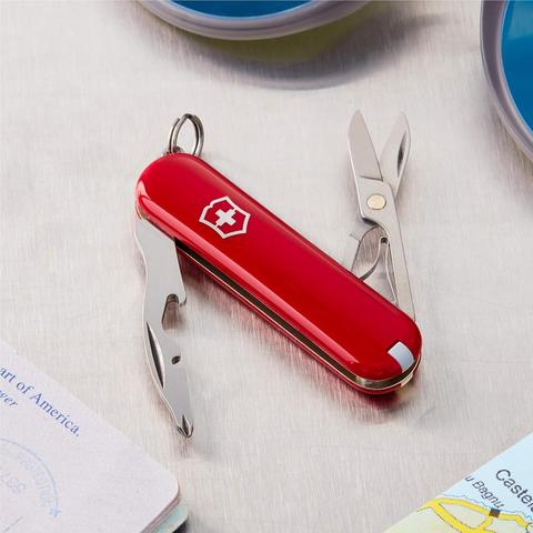 Product image of a red Victorinox Jetsetter 58 mm Swiss Army Knife, containing scissors and caplifter/screwdriver.