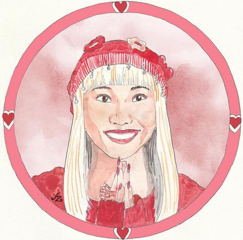 Niko Sasaki has white blond long hair and dark brown eyes. She smiles happily at the viewer. Niko wears a red top and a red knitted cap. Around her is a pink frame with some red hearts