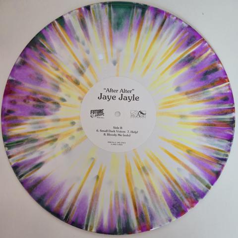 Jaye Jayle's "After Alter" vinyl, Subscriber Edition, limited to 240, Side B: orange and purple splatter in pale white with some overflowing green around the edge