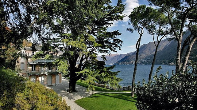 A photograph of Lake Como, a beautiful Italian house with a landscaped garden of mature trees, overlooks lake Como on a sunny day. (I said it looks terrible in the post, it doesn't it looks terrific!)