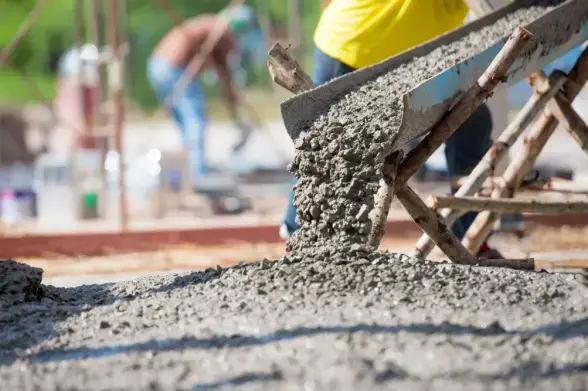 Cement being poured into foundations