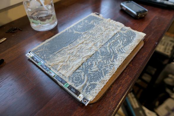 Photo of two soaked paper towel papers laying on top of the display.