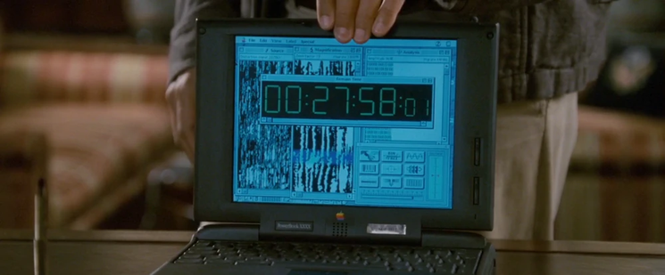 Screengrab of the movie Independence Day (1996), which shows a prototype PowerBook 5300 with a count-down on-screen.