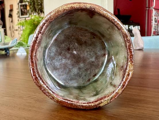 View looking into the cup, where I applied a single coat of “sunspot” glaze and then two coats of white crackle on top of that. It’s much lighter, with light streaks of a mossy green and coppery reds.