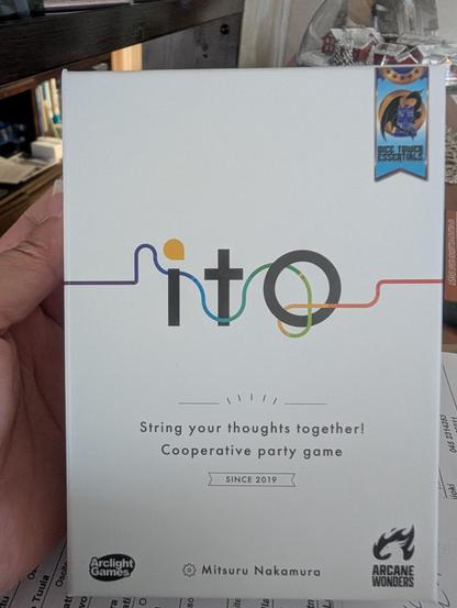 Cover of ito game - "String your thoughts together! Cooperative party game. Since 2019. Mitsuru Nakamura."