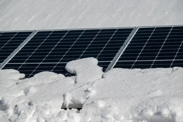 Snow covered solar panels