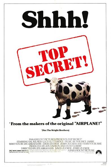 Four posters for the 1984 action comedy film “Top Secret!”. Two from the USA, One from Spain and One from Japan.