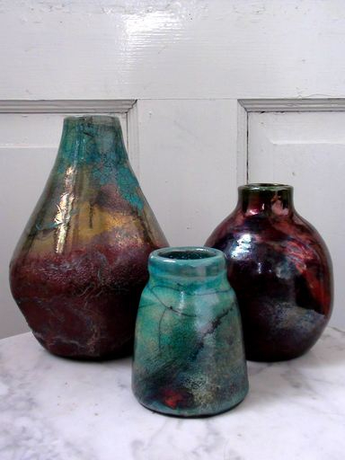 A group of raku pottery vases
