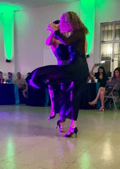 Liliana &amp; Martina both rise onto one toe each as they bring their other knees up, dancing
