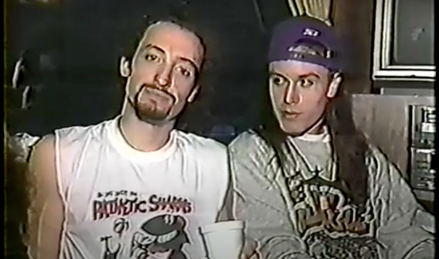 Picture of Mike Bordin and Mike Patton of Faith no More. Mike Bordin has a pathetic sharks t-shirt on.