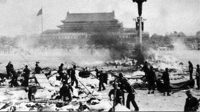 Black and white photo of the Tiananmen Square in the immediate aftermath of the student massacre on June 4, 1989.

 The #RedArmy army is clearing the square, putting at least hundreds of dead bodies in white plastic bags.

In the background, the #ForbiddenCity can be seen.

Source:
https://external-content.duckduckgo.com/iu/?u=https%3A%2F%2Fnsarchive.gwu.edu%2Fsites%2Fdefault%2Ffiles%2Fstyles%2Fwide%2Fpublic%2Fthumbnails%2Fimage%2F1989-tiananmen-crackdown.jpg%3Fitok%3DKJQc380Y&f=1&ipt=56f9292ccc46f00583ec18948cdbe25fad3de80f2010d5e9604c79fa60d626bb