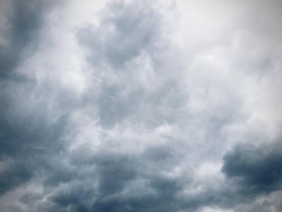 Cumulonimbus clouds stretch across the sky.