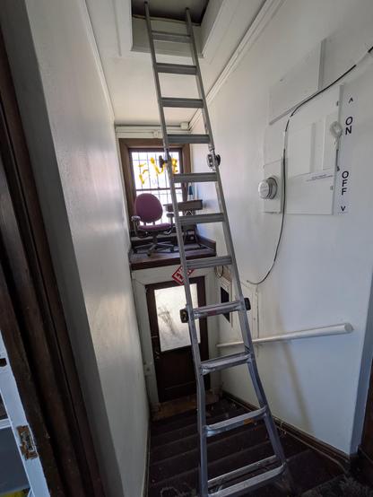 Ladder on stairs to get to the attic feels so wrong