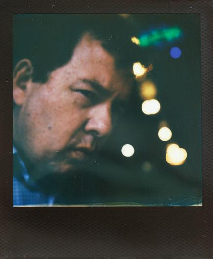 a black bordered Polaroid of Andrei Massenkoff at Free Gold Watch