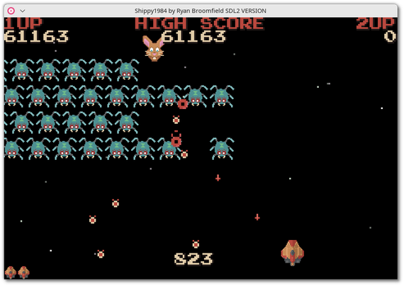 🕶️ A view of its IU with a single-player game in progress, with the player's ship at the bottom, waves of (insect-like) enemies above sowing various types of bombs, and yet another kind of (rabbit-headed) enemy above.

📚️ Shippy 1984 is a libre, multi-platform Space Invaders / Galaxians-style space shooter. Earth is under attack. Sora and Fumiko, the only trained pilots, race to defeat the invaders. The experimental ships are Earth's only hope. It features polished graphics, font, soundtrack and sound effects, 1- or 2-player (simultaneous) gameplay, a scoreboard, amusing comments from the protagonists, enemies with different behaviors, weapon bonuses, a shot accuracy meter, and good gameplay. Very good!