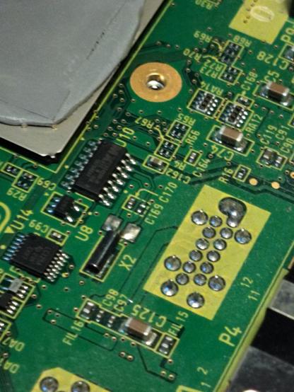A GameCube motherboard. Pins, chips, transistors.