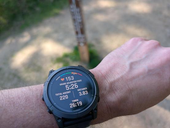 view of my watch at the Canfield golds Trail junction at Antoine Peak. the readout shows heart rate of 153 (just in threshold), a gap of 5:26, total Ascent 220 m, distance 3.83 km, timer 26:19 today is workday