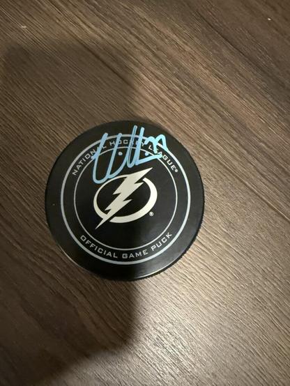 Signed pucks for sale