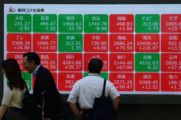 Tokyo stocks edge up over Wall Street gains