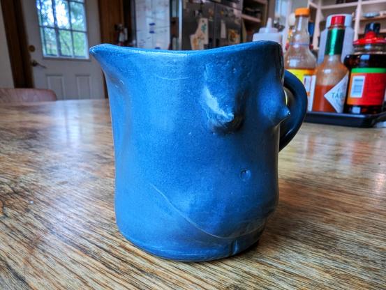 Handmade coffee mug that looks vaguely if not creepily like the swollen breasts and stomach of a pregnant woman