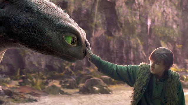 HOW TO TRAIN YOUR DRAGON, from left: Toothless the Night Fury dragon, Mason Thames, 2025. © DreamWorks / © Universal Pictures  /Courtesy Everett Collection