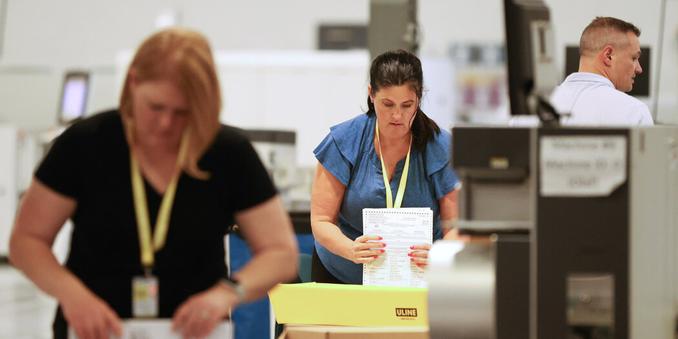Election workers doing their jobs