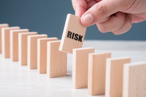 risk in line of dominoes