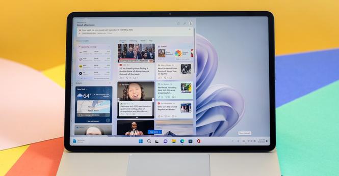 The Surface Laptop Studio 2 in tent mode, displaying Windows 11.