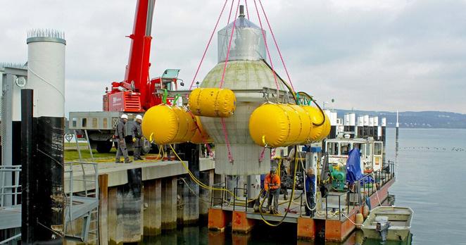 A 10-ft test sphere being dropped down to the bottom of Lake Constance in Europe