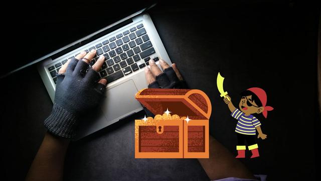 Keyboard, gloved hands, cartoon pirate and treasure chest.