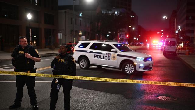 FBI agents cordon off the scene outside the Capital Jewish Museum following a shooting that left two people dead, in Washington, DC, in the early hours of May 22, 2025. Two Israeli embassy staffers were shot dead late Wednesday, May 21, outside a Jewish museum in Washington by a gunman who shouted " FBI agents cordon off the scene outside the Capital Jewish Museum following a shooting that left two people dead, in Washington, DC, in the early hours of May 22, 2025. Two Israeli embassy staffers were shot dead late Wednesday, May 21, outside a Jewish museum in Washington by a gunman who shouted "