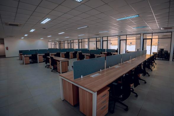 Empty office with lights on (Fiqih Alfarish/Unsplash) Empty office with lights on (Fiqih Alfarish/Unsplash)