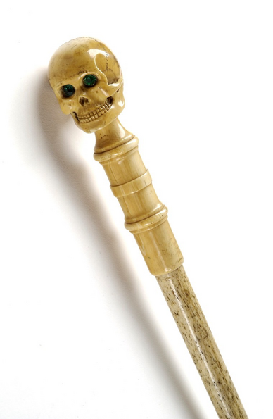 A long cane with a skull on top of it - where the users hand would rest